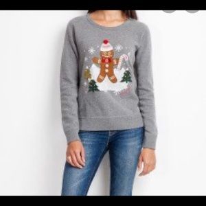 Cute ROOTS Christmas sweater large, very good used condition.